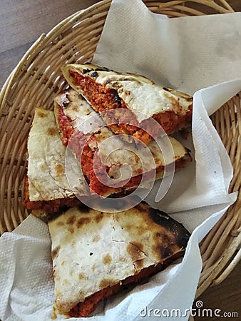 Indian food including curries, spice sauce and naan bread. Stock Photo