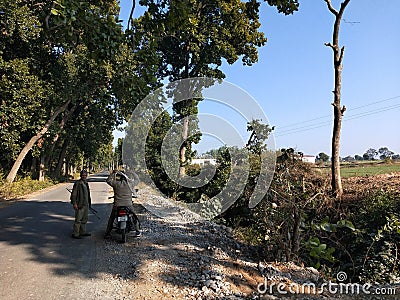 Indian forest guard near forest side road Editorial Stock Photo