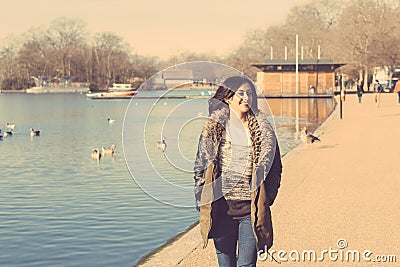 Indian girl walking at park in London Stock Photo