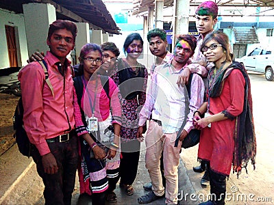 Indian girls and boys from Kawardha, Chhattisgarh play and enjoy Holi a Indian festival with friends Editorial Stock Photo