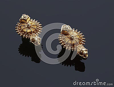 Indian style design Gold earrings worn during weddings Editorial Stock Photo