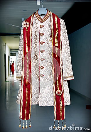 Indian groom`s wedding sherwani hanging Stock Photo