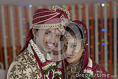 Indian Hindu Bride & Groom a happy smiling couple. Stock Photo