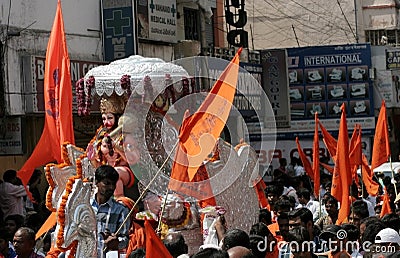 Indian Hindus take Hanuman jayanti procession, a Hindu celebration,with Hanuman Idol, Editorial Stock Photo