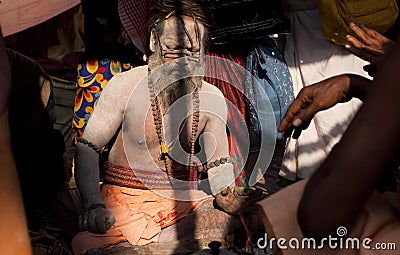 Indian holy man in the ashes Editorial Stock Photo