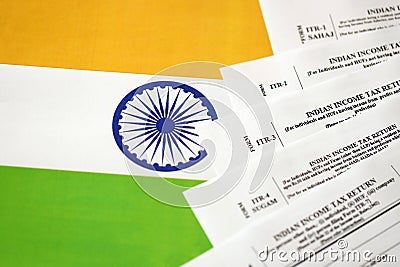 Indian income tax return blank forms on indian country flag Editorial Stock Photo