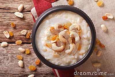 Indian kheer rice pudding with nuts and raisins close-up. horizontal top view Stock Photo