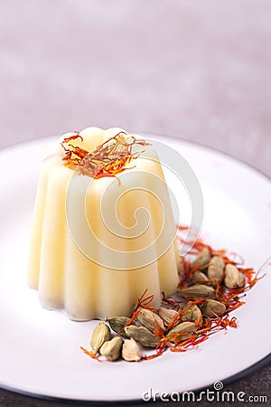 Indian kulfi dessert, ice cream with safron, mint, nuts Stock Photo