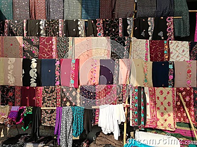 Indian Ladies clothes suet salwar in indian village markit Stock Photo