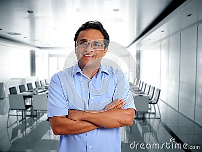 Indian latin businessman glasses in office Stock Photo