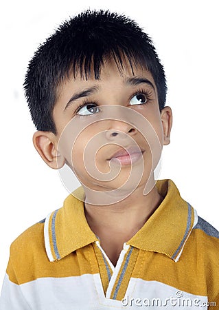 Indian Little Boy Looking up Stock Photo