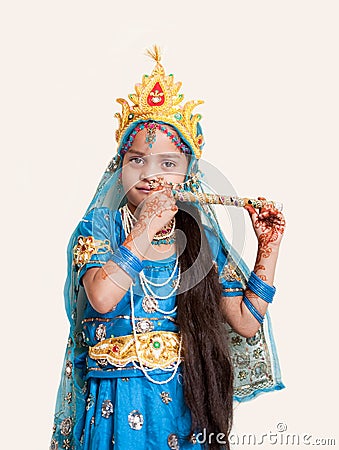 Indian little girl with flute Stock Photo