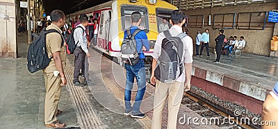 Indian local train with the motor man Editorial Stock Photo