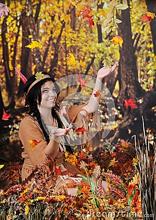 Indian Maiden Catching Falling Leaves Stock Photo