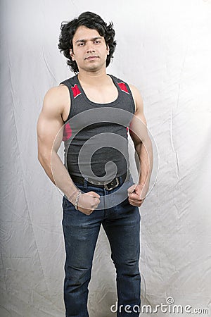 Indian male fit model wearing grey vest Stock Photo