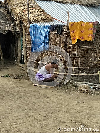 A Indian male working in his home ground Editorial Stock Photo