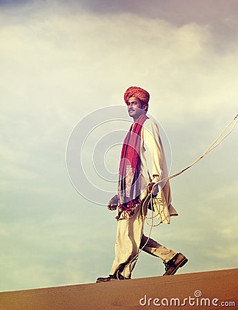 Indian Man Camel Desert Travel Concept Stock Photo