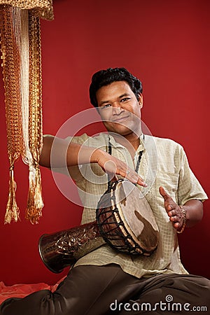 Indian Man Playing Tabla Stock Photo