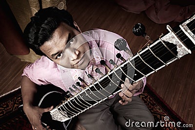 Indian Man Plays a Sitar Stock Photo