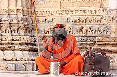 Indian man sitting at Jagdish temple, Udaipur, India Editorial Stock Photo