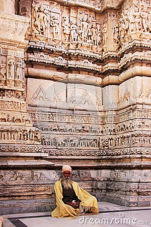 Indian man sitting at Jagdish temple, Udaipur, India Editorial Stock Photo