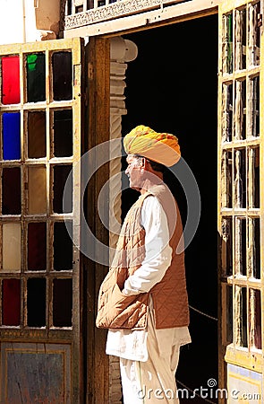 Indian man standing by the doorway at Mehrangarh Fort, Jodhpur, Editorial Stock Photo