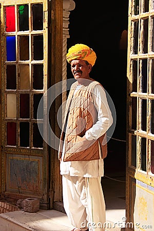Indian man standing by the doorway at Mehrangarh Fort, Jodhpur, Editorial Stock Photo