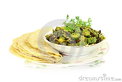 Indian masala fried okra bhindi or ladyfinger curry with tortilla Stock Photo