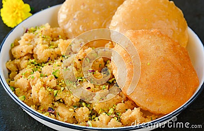 Poori and sooji halwa Stock Photo