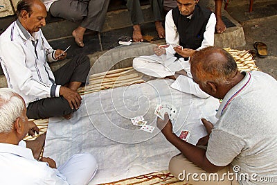 Indian men love to play cards. Editorial Stock Photo