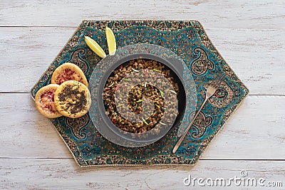 Indian minced meat Qeema on a white wooden table. Stock Photo