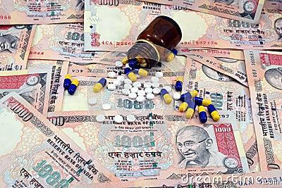 Indian Money, 1000 Rupee notes with medicines Stock Photo