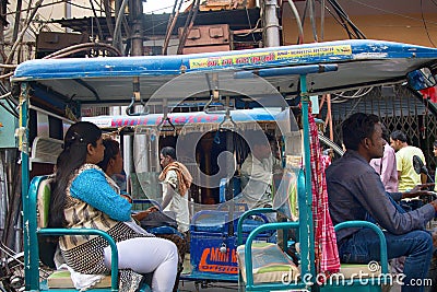 Indian Motor rickshaws and their passengers Editorial Stock Photo