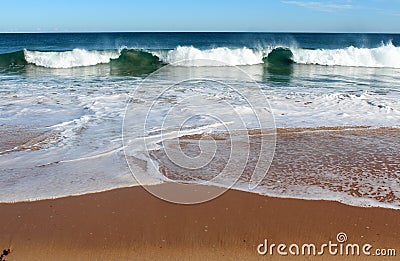 Indian Ocean waves rolling in at pristine Binningup Beach Western Australia on a sunny morning in late autumn. Stock Photo