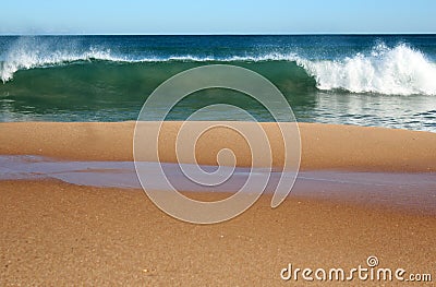 Indian Ocean waves rolling in at pristine Binningup Beach Western Australia on a sunny morning in late autumn. Stock Photo