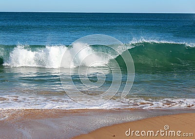 Indian Ocean waves rolling in at pristine Binningup Beach Western Australia on a sunny morning in late autumn. Stock Photo