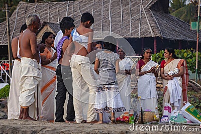 Indian Pilgrims on the Papanasam beach Editorial Stock Photo