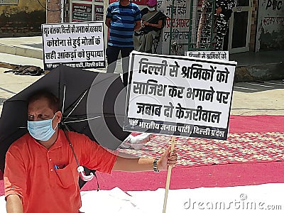 Indian politician protest against the Chief Minister of Delhi during Corona crown Editorial Stock Photo