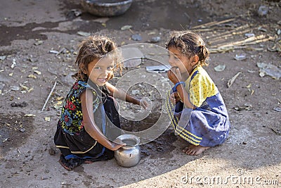 Indian poor children on the street. Mandu, India. Poverty is a major issue in India Editorial Stock Photo