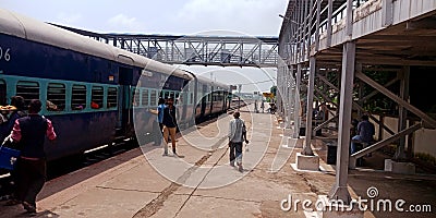 indian railway station vendors selling food in to the train in India aug 2019 Editorial Stock Photo