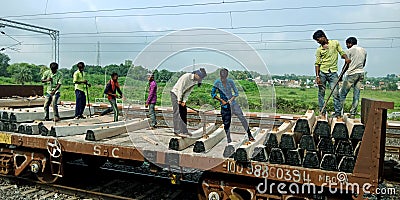 indian railway worker on the job for loading goods in train in India aug 2019 Editorial Stock Photo