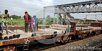 indian railway worker on the job for loading goods in train in India aug 2019 Editorial Stock Photo