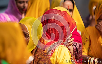Indian Rajasthani Women in Colorful Dress Red And yellow under Duppata Editorial Stock Photo