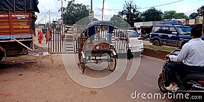 an indian rickshaw rider stuck in traffic jam during transportation in india dec 2019 Editorial Stock Photo