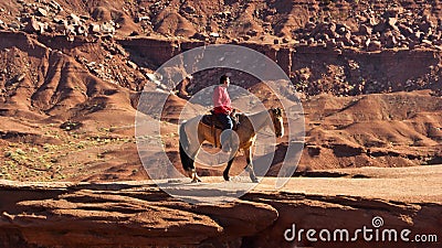 Indian Riding Horse in Monument Valley Editorial Stock Photo