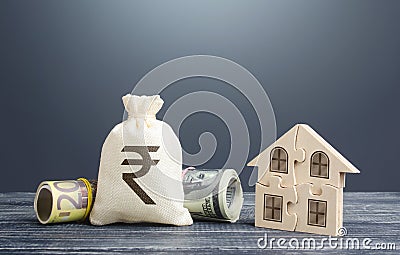 Indian rupee money bag and puzzle house. Mortgage loans building maintenance and utility services costs. Energy efficiency, Stock Photo