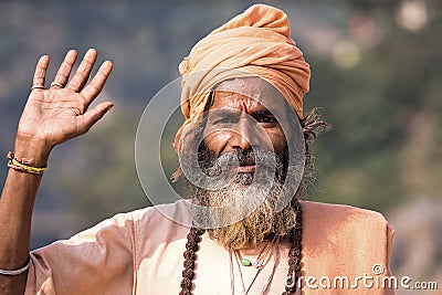 Indian sadhu welcomes Editorial Stock Photo