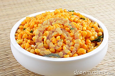 Indian savory snack mixture, served in bowl. Stock Photo