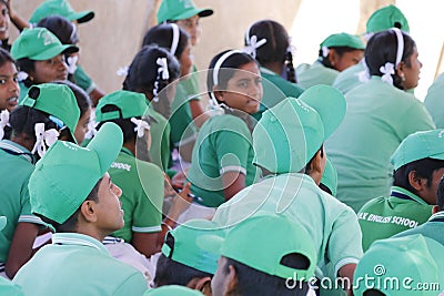 Indian school girls with green uniform sitting Editorial Stock Photo