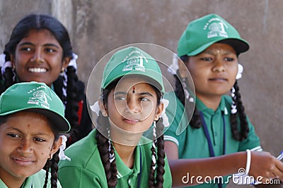 Indian school girls with green uniform sitting Editorial Stock Photo